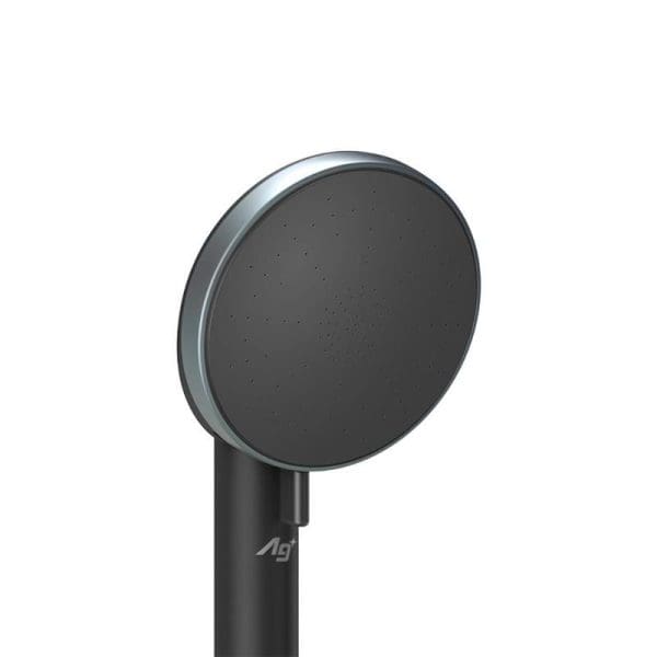 I notice there's a mismatch between the image and the product description. The image shows what appears to be a circular wireless charger or similar electronic device, not a Panasonic water heater jet pump. Alt tag: "Black circular wireless charging device with dark surface and small perforations, mounted on black stand with 4G branding"