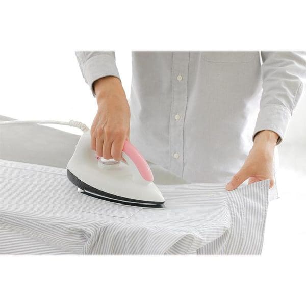 Person ironing a white striped shirt with Panasonic NI-317W polished iron featuring pink handle, 1000W power, and 0.9kg weight on ironing board.