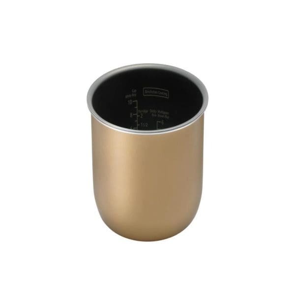 Panasonic SR-DM184KSK rice cooker inner pot with gold exterior, black non-stick interior coating, and measurement markings for cooking rice and other meals.