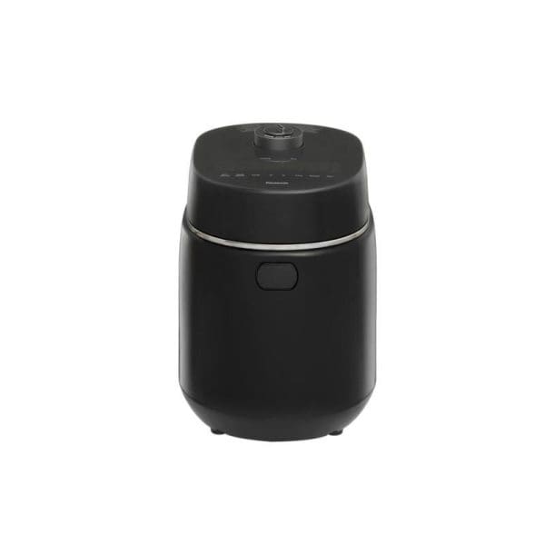 Black Panasonic rice cooker SR-DM184KSK with dome lid, control panel, and compact cylindrical design for multifunctional healthy meal preparation.