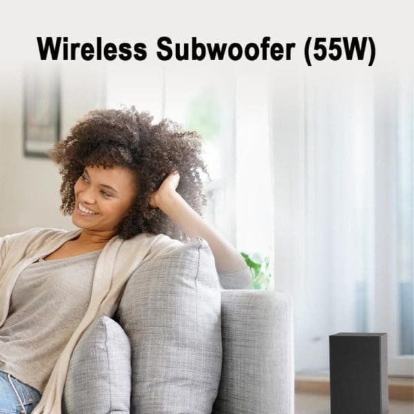 Woman relaxing on gray couch smiling while listening to Panasonic SC-HTB150 wireless subwoofer (55W) stereo home theater audio system in bright living room.
