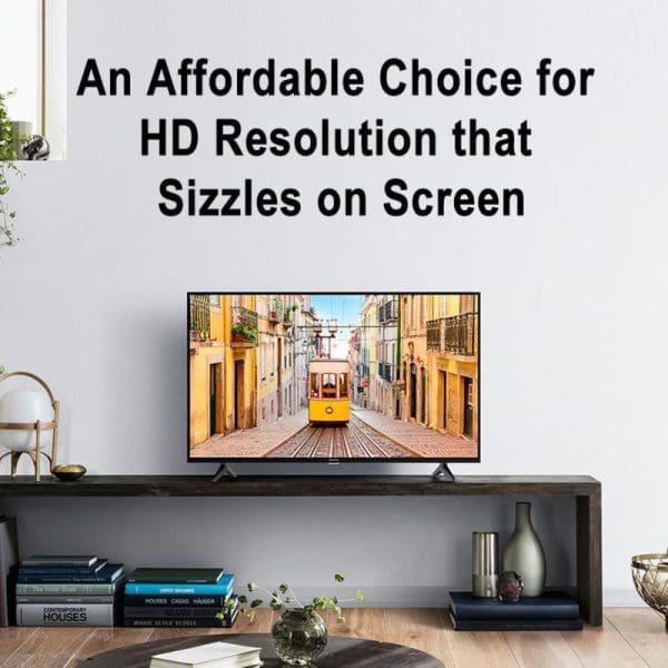 PANASONIC TH-32L400K 32 inch LED HD TV displayed on modern TV stand in contemporary living room setting with books and decorative items.