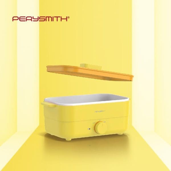 PerySmith 1.8L BBQ Multi Cooker Ecohealth Series BQ1000 in yellow with wooden lid, white interior bowl, and control dial on yellow background.