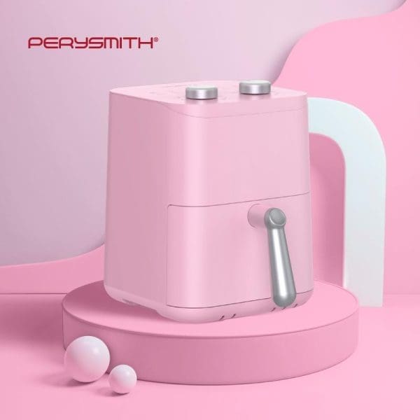 PerySmith PS1530 EcoHealth Series Air Fryer in pink color with silver accents, featuring compact design with handle and control buttons, displayed on pink platform.