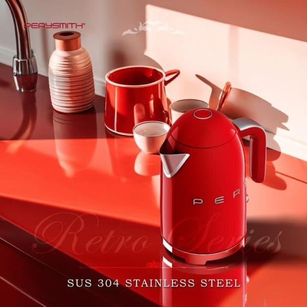 PerySmith KT1010 red retro electric kettle made of SUS 304 stainless steel displayed on red kitchen counter with matching cup and accessories.