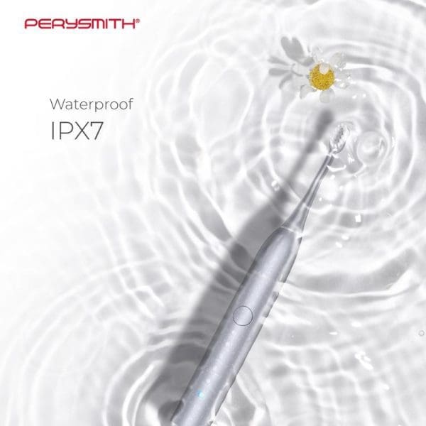 PerySmith iCare Series OX10 electric toothbrush with IPX7 waterproof rating, featuring silver handle and clear brush head against water ripple background with daisy flower.