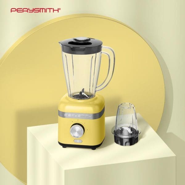 PerySmith PS3250 yellow high-speed blender with glass pitcher, black lid, and additional grinding cup attachment displayed on white platform with yellow circular background.