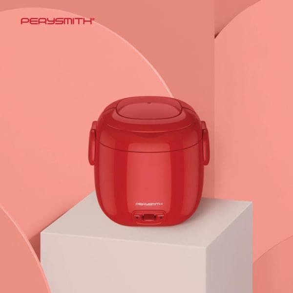PerySmith Mini Rice Cooker Easycooking Series Q10 in red color displayed on white platform against coral pink geometric background for barangelektrik.my product showcase.