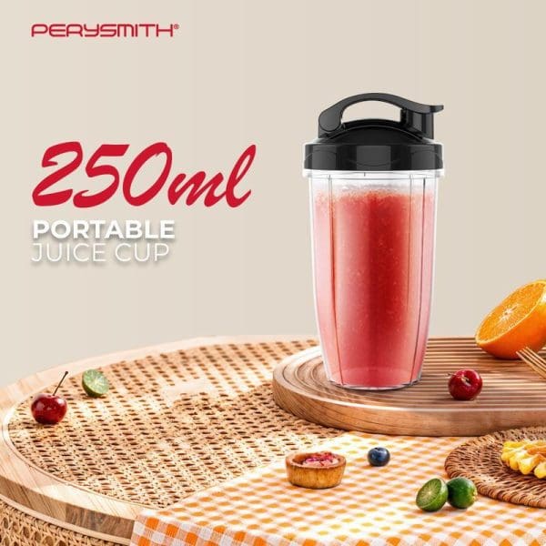 PerySmith 250ml portable juice cup blender with red smoothie, surrounded by fresh fruits including oranges, cherries, and berries on wooden table setting.