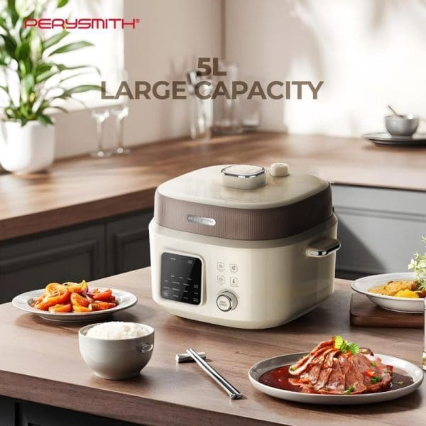 PerySmith PC1000 EasyCooking Series 5L pressure cooker in cream color on kitchen counter with cooked dishes, rice bowl, and chopsticks displayed.