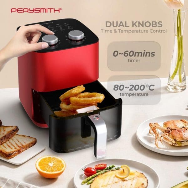 PerySmith PS1620 red air fryer with dual control knobs, 0-60 minute timer, 80-200°C temperature range, open basket showing fried food, surrounded by cooked dishes.