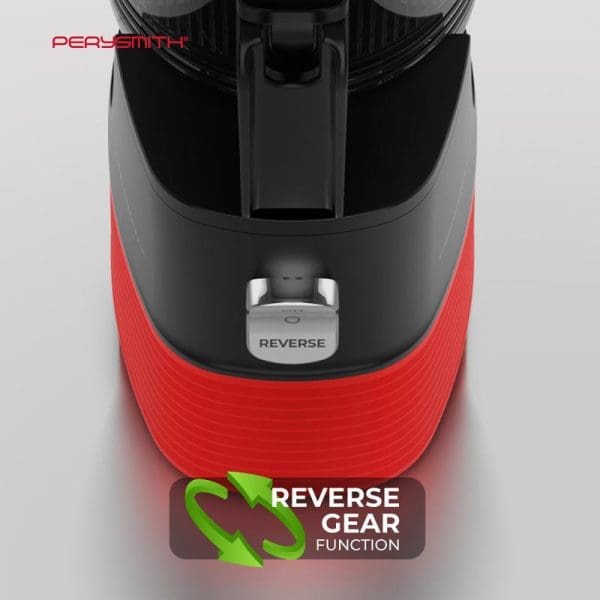 PerySmith PS600 EcoHealth slow juicer showing reverse gear function button and red base with black top assembly and feeding chute.