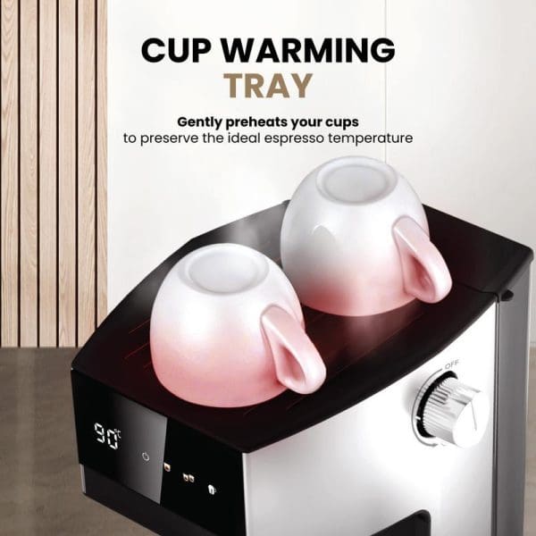 Russell Taylors EM1 espresso machine with cup warming tray feature, showing two white cups being preheated on black warming surface with digital temperature display.