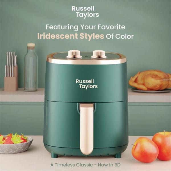Russell Taylors 3D Air Fryer Large 4.2L in iridescent green with rose gold accents, displayed on kitchen counter with fresh fruits and vegetables.