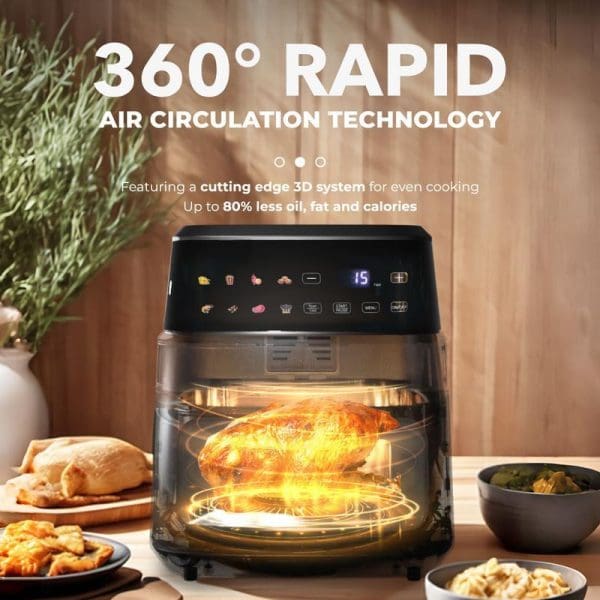 Russell Taylors 3D Visible Window Digital Air Fryer 6.5L with 360° rapid air circulation technology, showing cooked chicken inside transparent cooking chamber with digital controls.