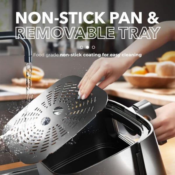 Russell Taylors 3D Visible Window Digital Air Fryer 6.5L Z7 with non-stick pan and removable tray being washed under running water in kitchen sink.