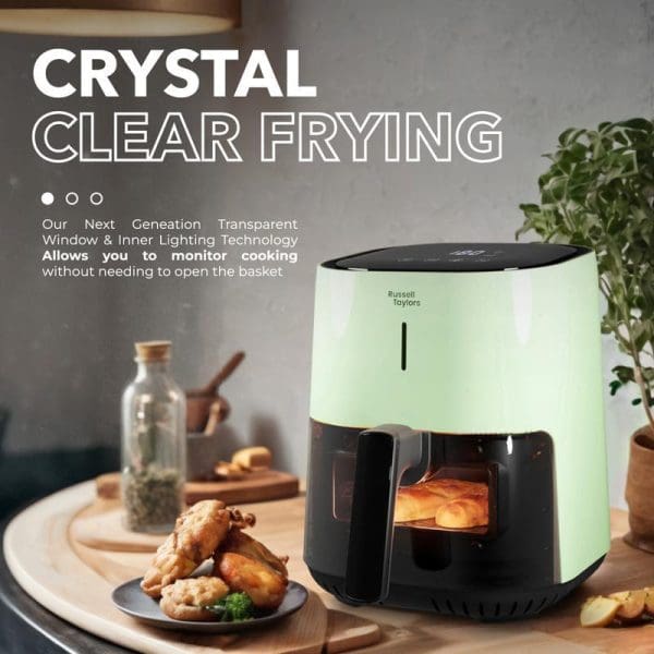 Russell Taylors 3D Visionary Digital Air Fryer with transparent window showing cooked chicken inside, featuring crystal clear frying technology on kitchen counter.