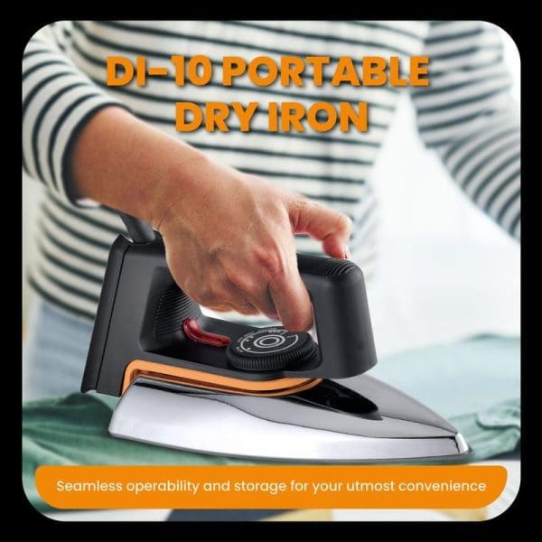 Russell Taylors DI-10 Portable Dry Iron with black handle, non-stick soleplate, and orange accents being held by hand over white fabric background.