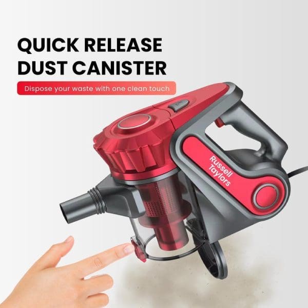 Russell Taylors VC-20 red handheld cyclone vacuum cleaner with quick release dust canister feature, showing one-touch waste disposal mechanism with hand demonstration.