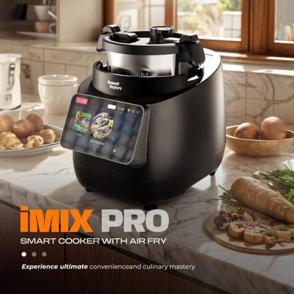 Russell Taylors iMix Pro Smart Cooker with Air Fryer featuring touchscreen display, positioned on marble kitchen counter with fresh ingredients and prepared food nearby.