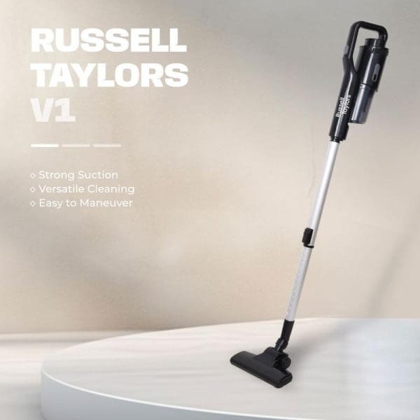 Russell Taylors V1 cordless stick vacuum cleaner with black and silver design, featuring strong suction, versatile cleaning, and easy maneuverability capabilities displayed on white surface.