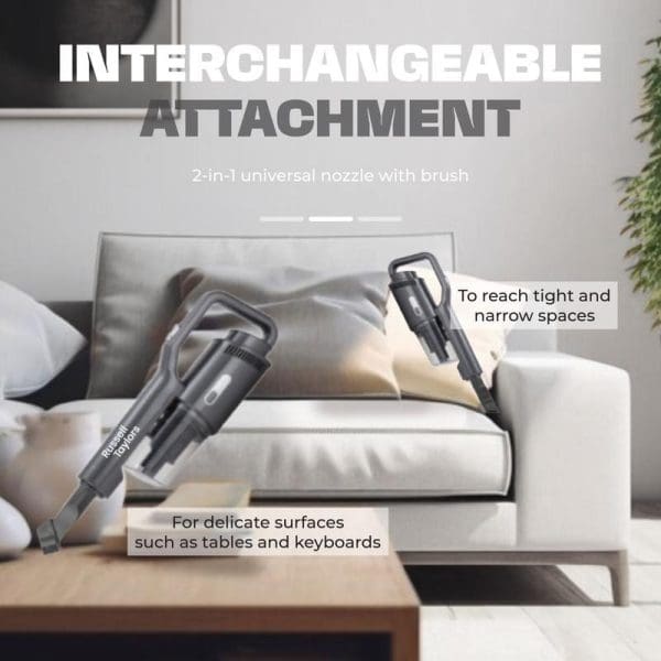 Russell Taylors V1 vacuum cleaner with interchangeable 2-in-1 universal nozzle and brush attachment for cleaning tight spaces and delicate surfaces like tables and keyboards.