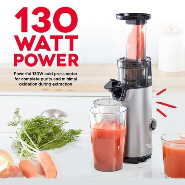 Russell Taylors 130W cold press slow juicer extracting carrot juice into glass, with fresh carrots and greens on counter, highlighting powerful motor and minimal oxidation.
