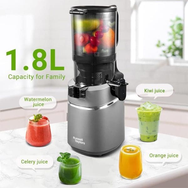 Russell Taylors SJ3 Cold Press Slow Juicer with 1.8L capacity, wide feeding tube, displaying various fresh juices including watermelon, kiwi, orange, and celery on kitchen counter.