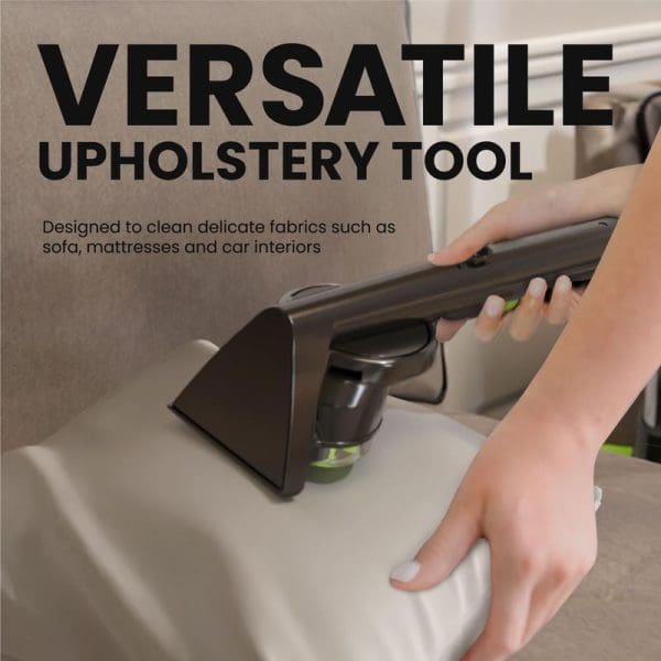 Russell Taylors Multi-Function Vacuum Cleaner Carpet Washer CW-800 versatile upholstery tool being used on white cushion, designed for cleaning delicate fabrics like sofas, mattresses and car interiors.