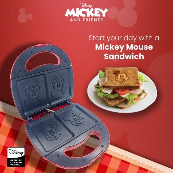 Russell Taylors Disney Mickey Mouse sandwich maker with red and gray design, showing Mickey-shaped bread impressions and a completed sandwich on plate.
