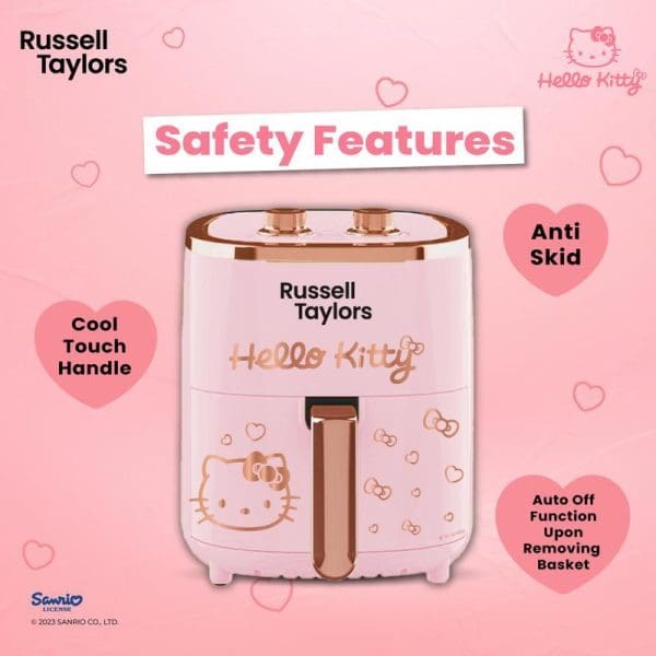 Russell Taylors Hello Kitty pink air fryer with safety features highlighted: cool touch handle, anti-skid base, and auto-off function when basket removed.