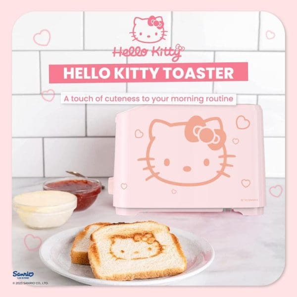Russell Taylors x Sanrio Hello Kitty pink bread toaster with Hello Kitty face design, showing toasted bread with Hello Kitty pattern imprint on white kitchen counter.