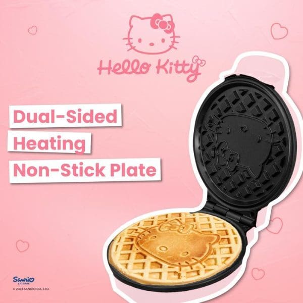 Russell Taylors x Sanrio Hello Kitty Waffle Maker MW-25 with dual-sided heating and non-stick plate, showing Hello Kitty-shaped waffle on pink background.