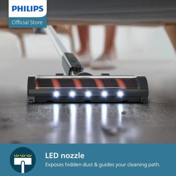 Philips XC3133 Cordless Vacuum Cleaner dengan LED nozzle yang menerangi habuk tersembunyi dan memandu laluan pembersihan di atas lantai rumah.