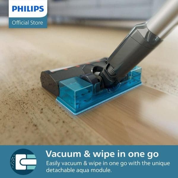 Philips XC3133 Penyedut Habuk Tanpa Wayar dengan modul aqua boleh tanggal biru untuk vacuum dan lap dalam satu gerakan di atas lantai kayu.